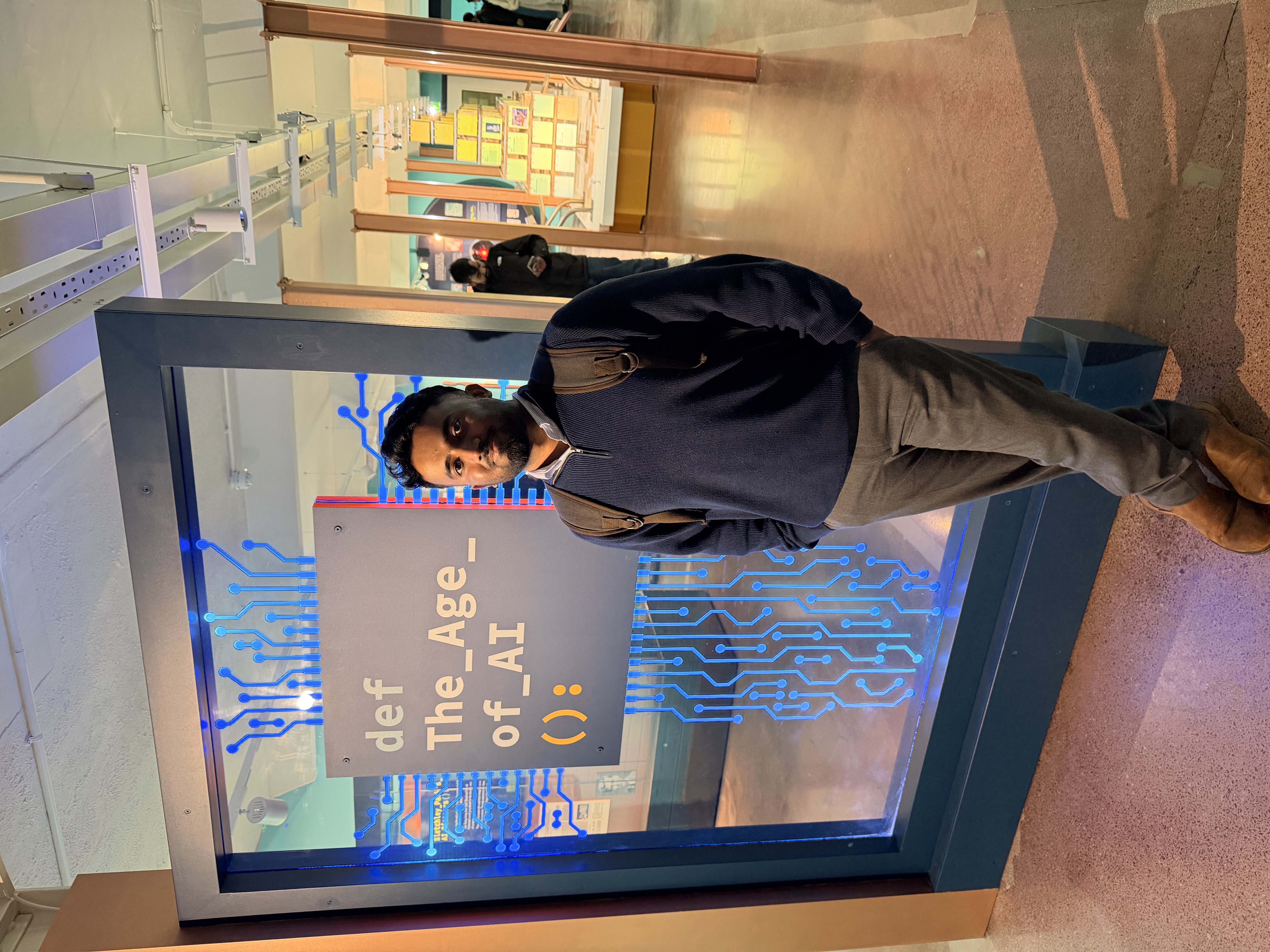 The Age of AI neon exhibit